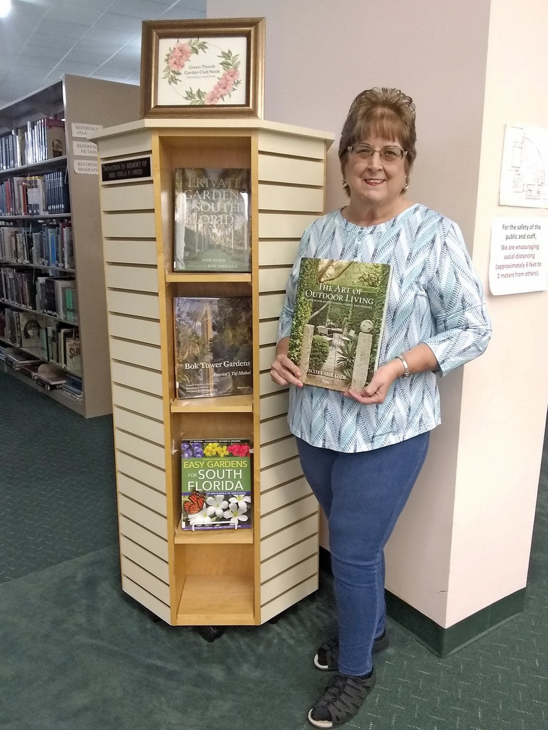 CLEWISTON — Margo Fatzinger presented Clewiston Public Library with a donation of the book "The Art of Outdoor Living: Gardens Gardens for Entertaining Family and Friends" by Scott Shrader.